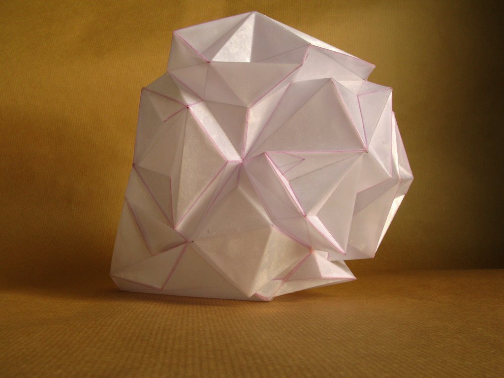 I folded a lot of papers when I stopped being a bronze sculptor. A need to lighten up, no doubt. However, I sometimes convert paper into bronze. In this case, I use wax/lost paper instead of the traditional lost wax. I use thin paper because it deforms and inflections linked to the tensions of folding appear and leave a trace. These stigmata of the action of folding paper tell the story of the formation of volume in the manner of a tree’s bark, which cracks and deforms as it grows.
