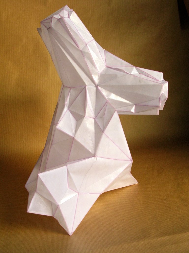 I folded a lot of papers when I stopped being a bronze sculptor. A need to lighten up, no doubt. However, I sometimes convert paper into bronze. In this case, I use wax/lost paper instead of the traditional lost wax. I use thin paper because it deforms and inflections linked to the tensions of folding appear and leave a trace. These stigmata of the action of folding paper tell the story of the formation of volume in the manner of a tree’s bark, which cracks and deforms as it grows.