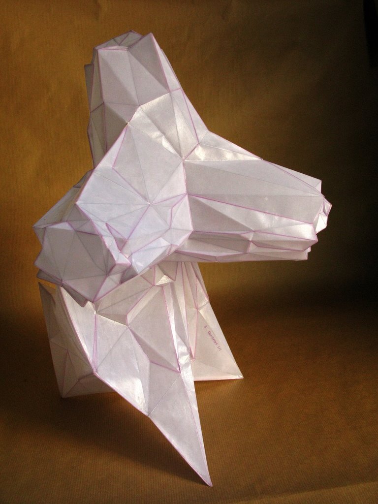 I folded a lot of papers when I stopped being a bronze sculptor. A need to lighten up, no doubt. However, I sometimes convert paper into bronze. In this case, I use wax/lost paper instead of the traditional lost wax. I use thin paper because it deforms and inflections linked to the tensions of folding appear and leave a trace. These stigmata of the action of folding paper tell the story of the formation of volume in the manner of a tree’s bark, which cracks and deforms as it grows.
