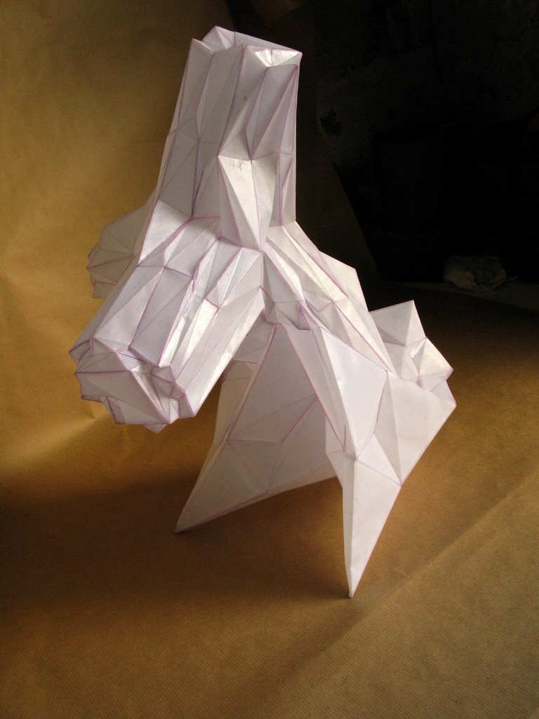 I folded a lot of papers when I stopped being a bronze sculptor. A need to lighten up, no doubt. However, I sometimes convert paper into bronze. In this case, I use wax/lost paper instead of the traditional lost wax. I use thin paper because it deforms and inflections linked to the tensions of folding appear and leave a trace. These stigmata of the action of folding paper tell the story of the formation of volume in the manner of a tree’s bark, which cracks and deforms as it grows.