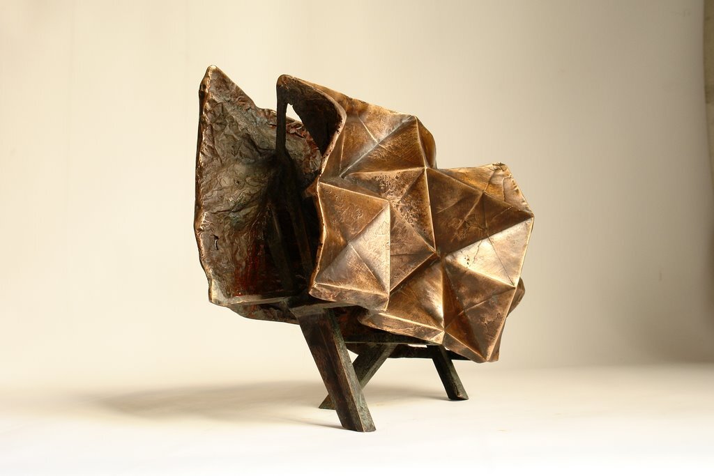 I folded a lot of papers when I stopped being a bronze sculptor. A need to lighten up, no doubt. However, I sometimes convert paper into bronze. In this case, I use wax/lost paper instead of the traditional lost wax. I use thin paper because it deforms and inflections linked to the tensions of folding appear and leave a trace. These stigmata of the action of folding paper tell the story of the formation of volume in the manner of a tree’s bark, which cracks and deforms as it grows.